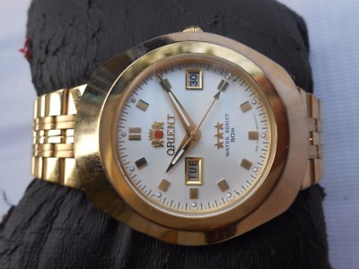 orient automatic gold