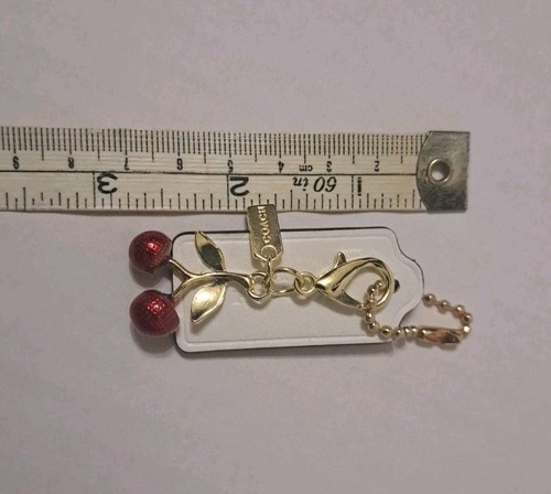 Coach Cherry Bag Charm Keychain Gold/WhiteTag - Picture 6 of 6