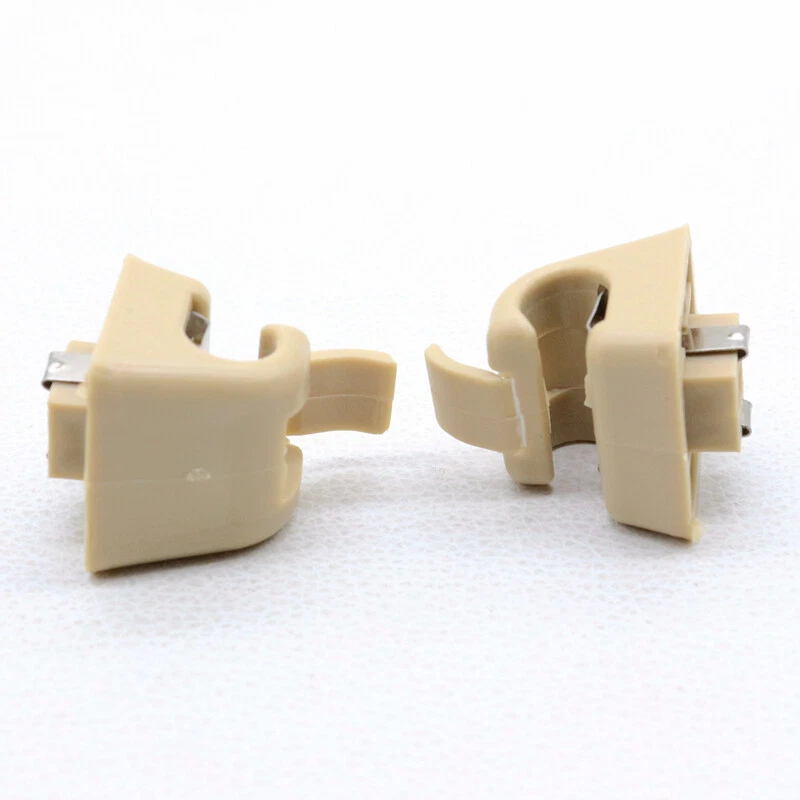 Clip de soporte de parasol de plástico beige 2 piezas para Mercedes-Benz 126-810-00-12-8412 Foto 3 de 4