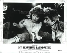 1986 Press Photo Business Talk Scene from "My Beautiful Laundrette" - pip22899