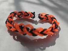RUBBER BAND BRACELET ORANGE  BLACK 6 INCHES LONG FOR KIDS CHEAP  GOOD QUALITY