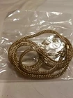 Gold necklace vintage listing as costume jewelry not for sure if it's real .