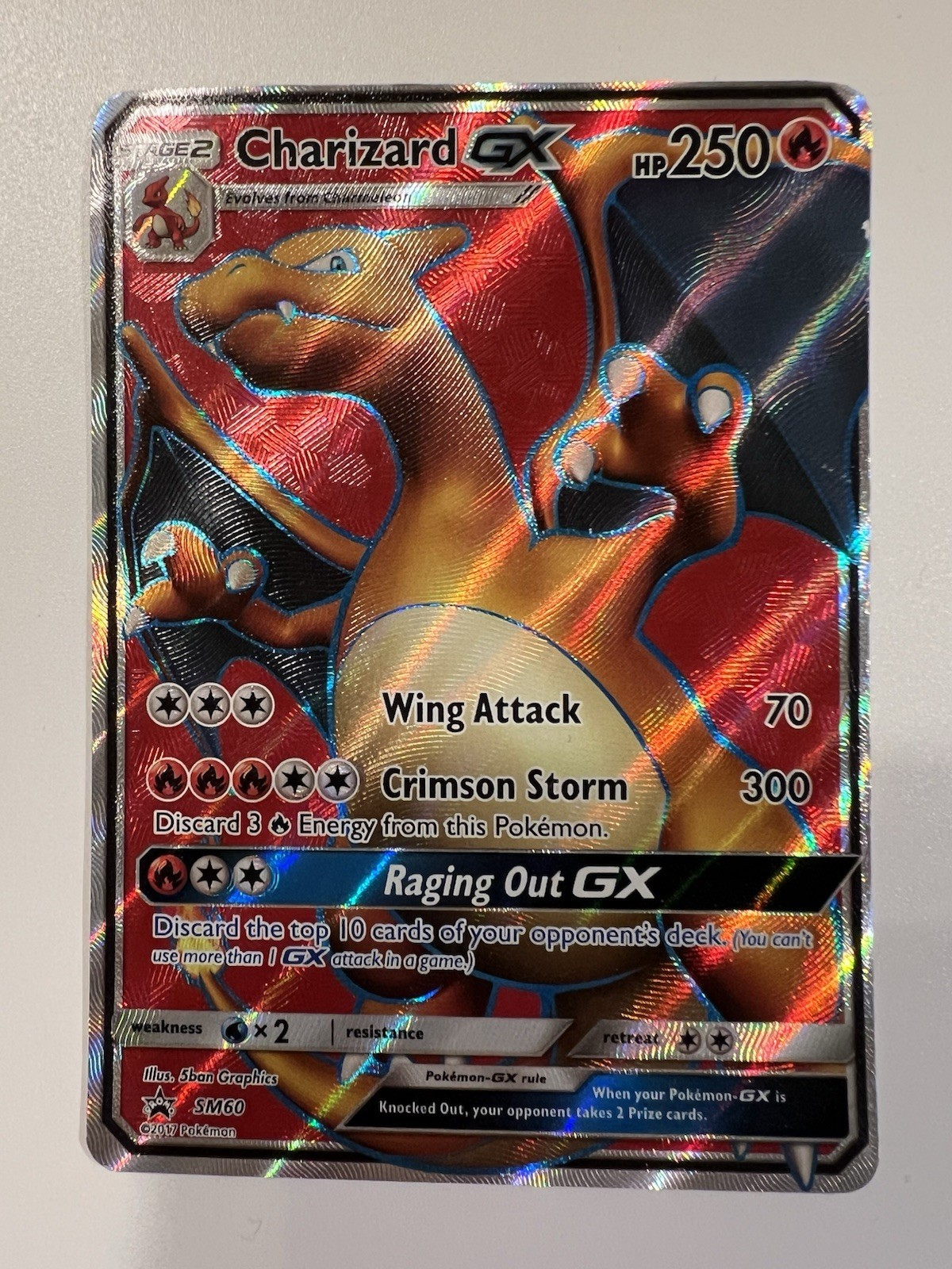 Pokémon card, a Charizard GX SM60 Black Star Promo card