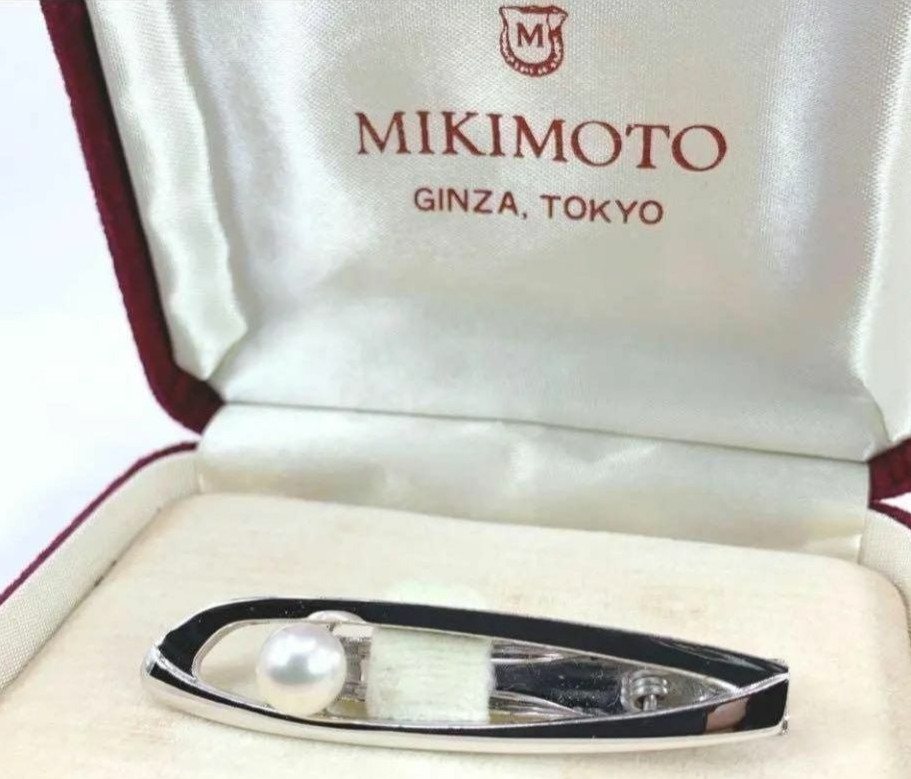 An authentic vintage Mikimoto silver tie clip with a 7mm cultured pearl — one of the most prestigious names in jewelry, boxed and ready to gift.