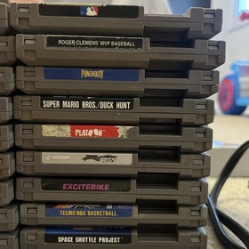 Authentic Nintendo (NES) Lot Of 18 Games, 2 Consoles, 4 Controllers And More