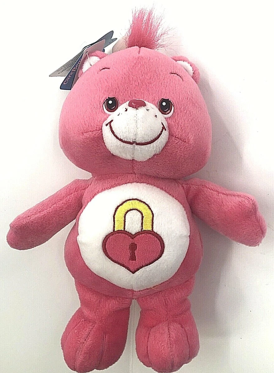 Pink care bear sales with heart lock
