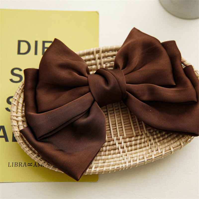 BOW-KNOT HAIR CLIP IN EGG SHELL SILK 358294