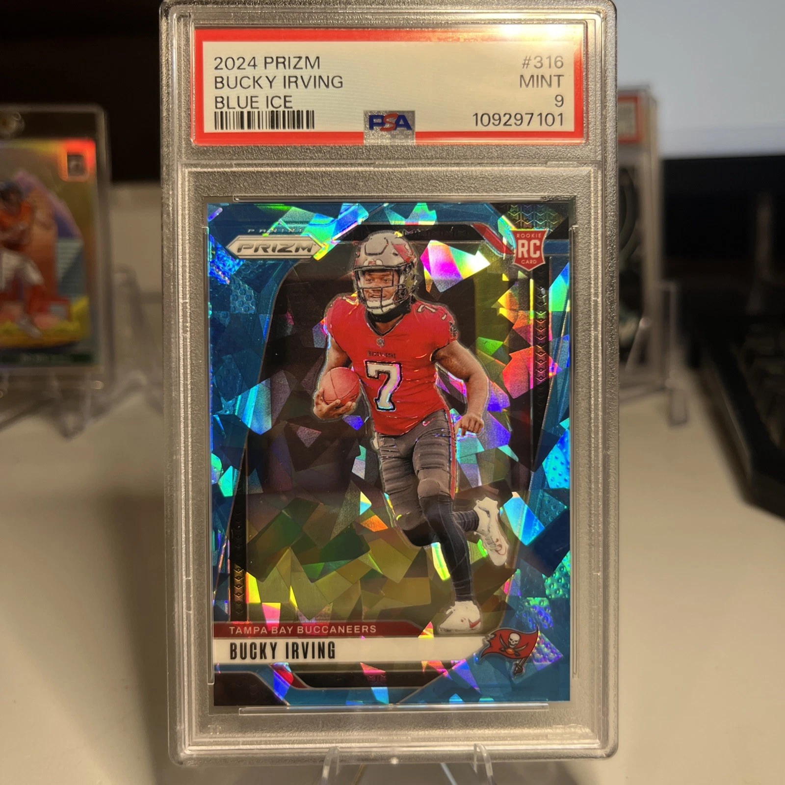 Deal for 2024 Panini Prizm Rookies Bucky Irving #316 Blue Ice Prizm /99 (RC) PSA 9
