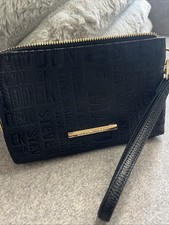 Steve Madden Mixed Logo Embossed Soft Wristlet 7.5 X 4.5 Black