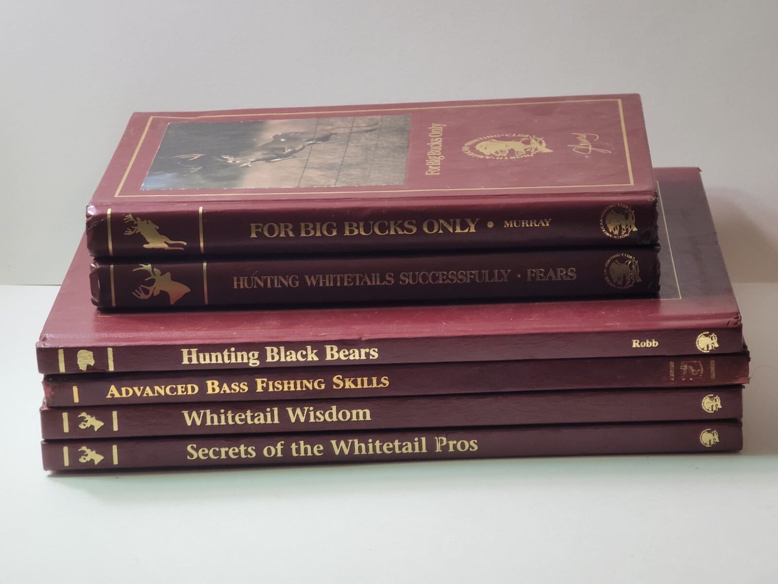 Discover 6 Hardcover North American Hunting Club Books on Whitetails Bass Fishing and Bears