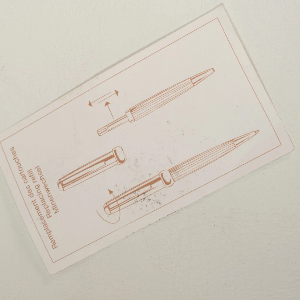 Bolígrafo Ted Lapidus plateado de acero inoxidable con tinta azul en estuche ¡Bonito! Foto 3 de 4