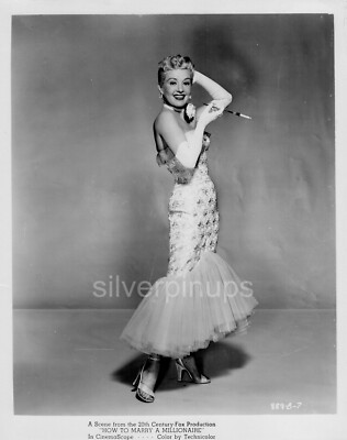 marilyn monroe mermaid dress Marilyn Monroe in Red Velvet Oleg Cassini Dress 1952
