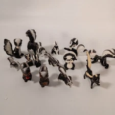 Vintage Ceramic Skunk Figurines Lot Set of 14 Black White Whimsical Collectible