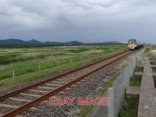 PHOTO  ROSSLARE TRAIN HEADING SOUTH HAVING JUST LEFT KILCOOLE THE TRAIN CONTINUE