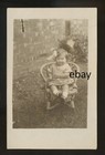 circa 1910 Child, Darling chubby baby in a wicker chair Americana # 3  RPPC — photo 1