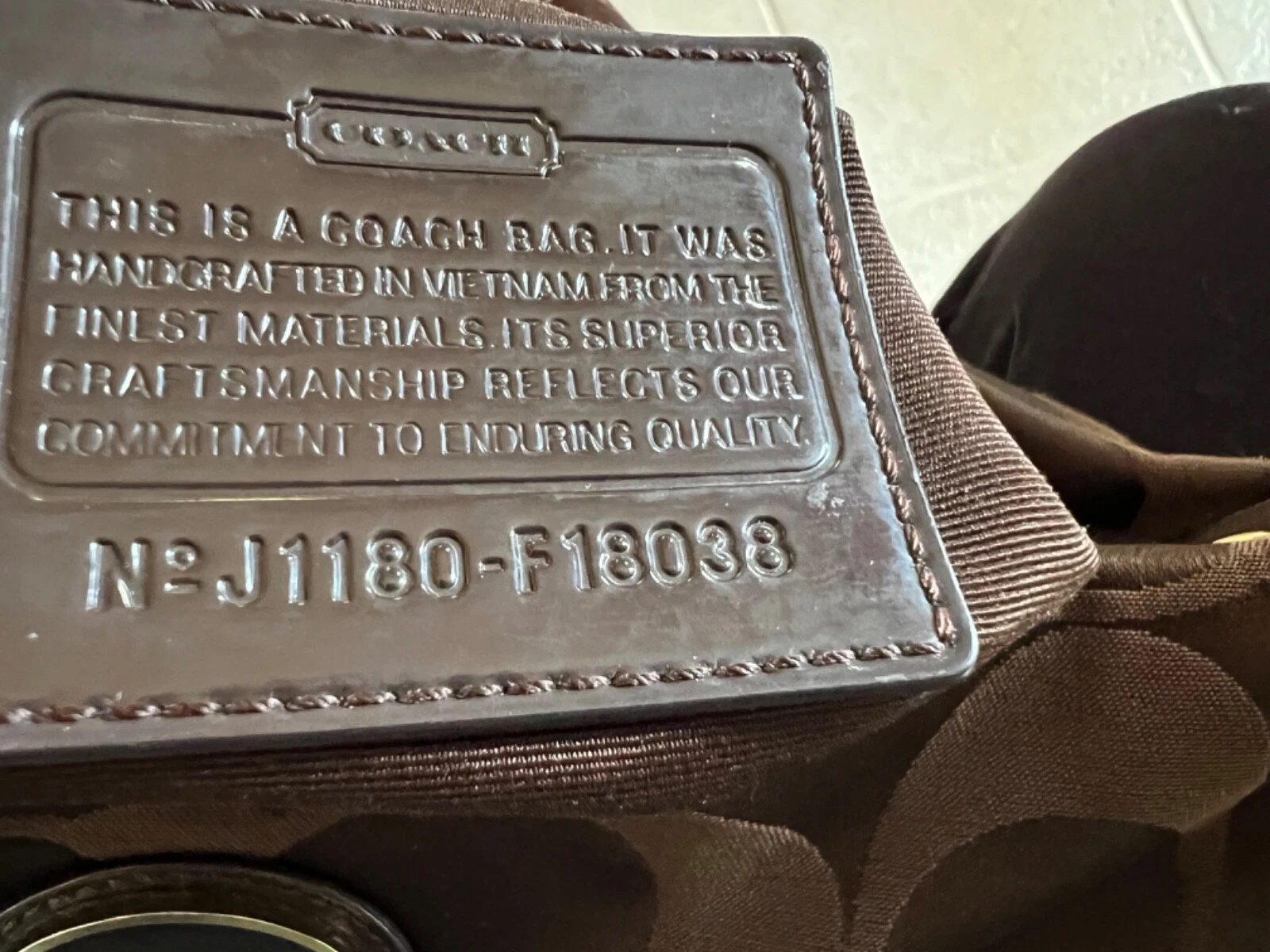 Coach Borsa Portadocumenti a Tracolla Marrone Tessuto Pelle F18038