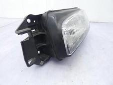 Feu avant (phare) Mazda 323