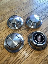 (4)  1973-1977 Monte Carlo Wheel Covers Center Hub Caps Trim Molding