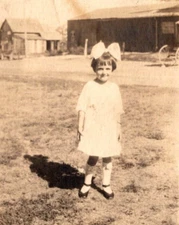 RPPC Adorable Young Girl With Bow in Hair  Real Photo  Postcard  c1920