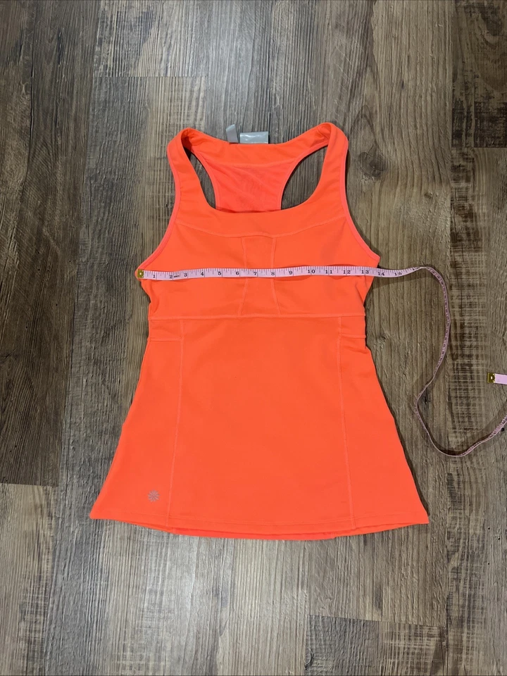 Sujetador sin mangas Athleta para mujer pequeño espalda corredora incorporado demasiado coral bolsillos tenis talla S Foto 4 de 4