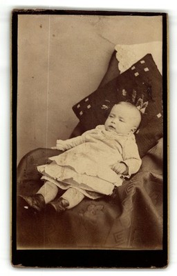 Antique Cdv Circa 1880s Cute Baby In Dress Reclining On Cushion Vintage Portrait