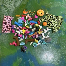 Mixed lot of Barbie Shoes and other Accessories Pool Float Clothing Boots Heels