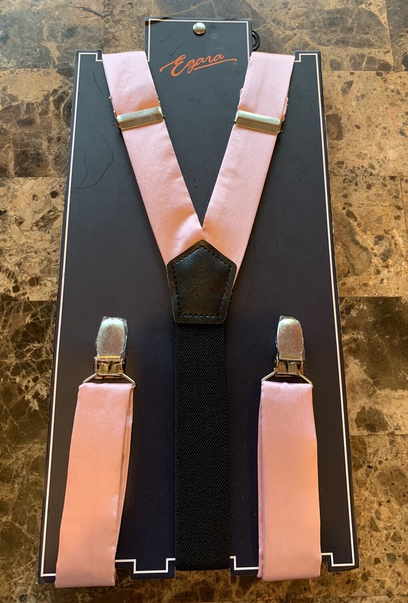 black dress shirt with pink suspenders Young man in pink shirt and suspenders stands by tree. photo  Free Fashion  Image on Unsplash
