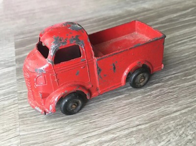 red metal toy truck