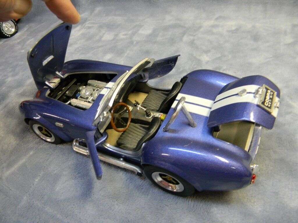 1/18 SCALE 1964 SHELBY COBRA 427 S/C ROADSTER LT. BLUE ROAD 1/18 SCALE 1964 SHELBY COBRA 427 S/C ROADSTER LT. BLUE ROAD