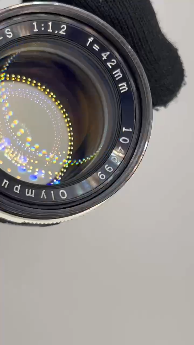 Video [OPT MINT] Olympus H.Zuiko Auto-S 42mm f/1.2 MF Lens