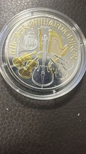 2009   philharmoniker 1 oz fine silver / gold  bullion