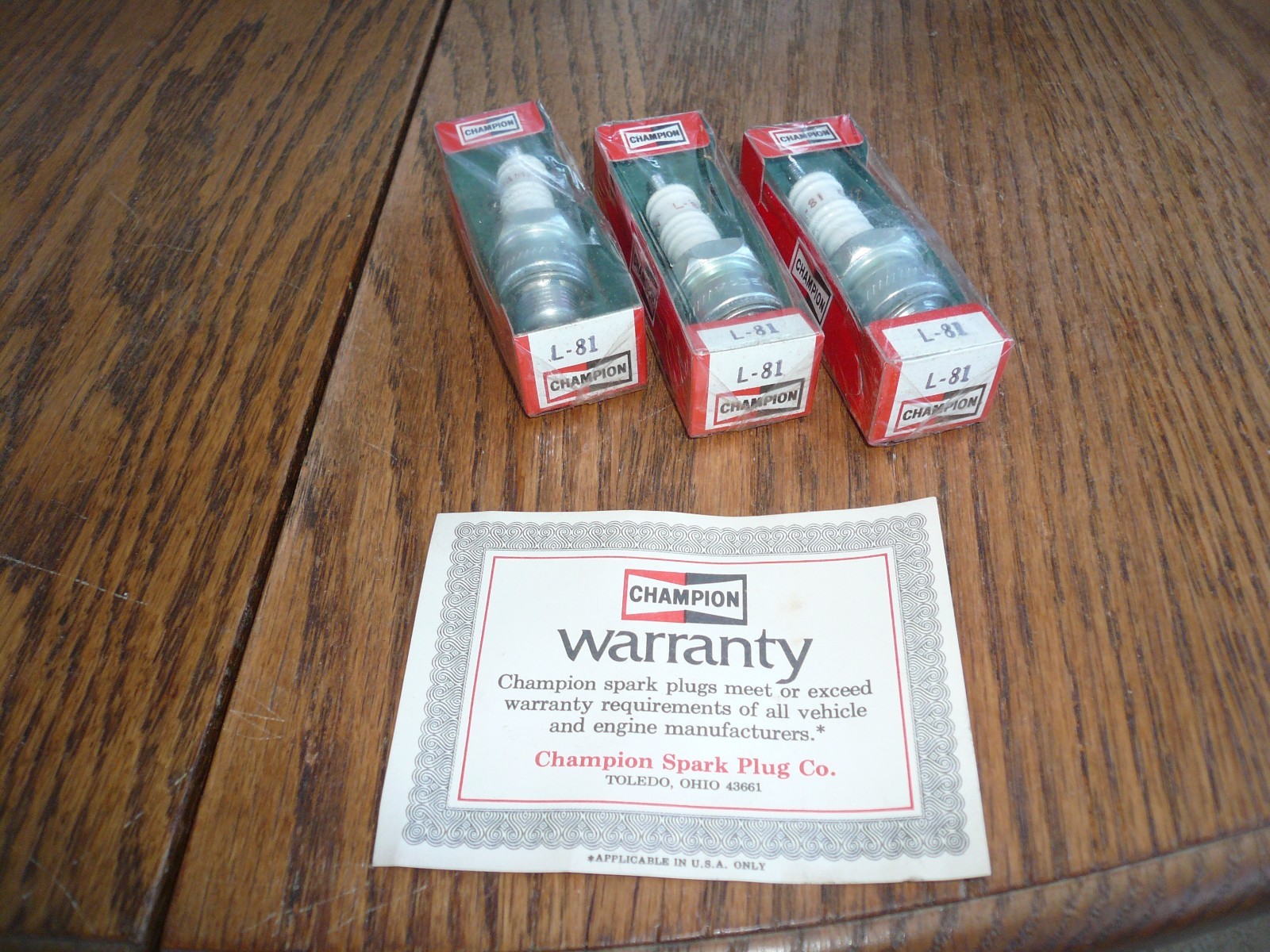 CHAMPION QUANTITY #L-81  SPARK PLUGS ONE MISSING CAP - Three