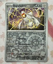 Pokémon TCG Duraludon 129/191 Sv08: Surging Sparks Reverse Holo