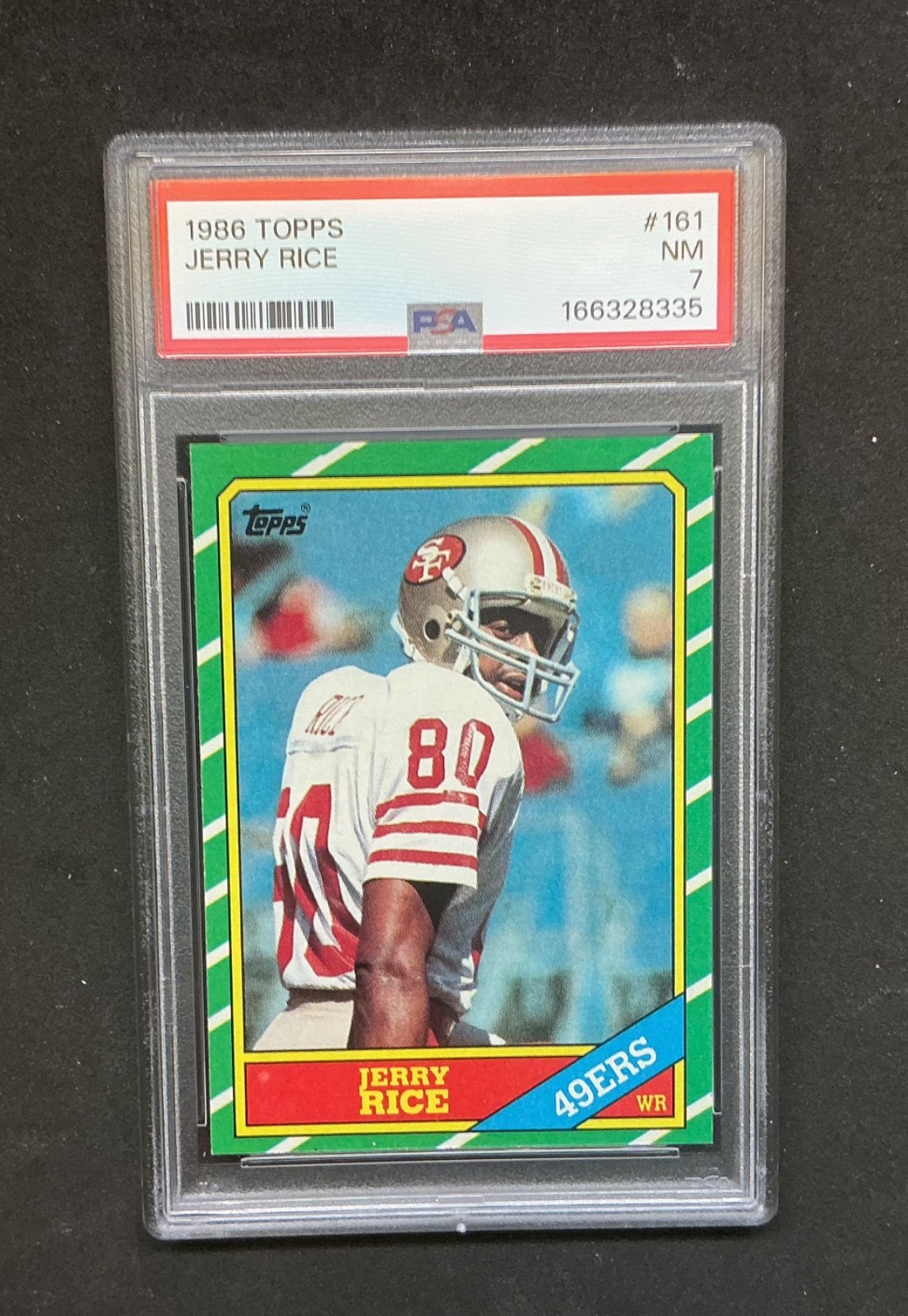 1986 Topps - Jerry Rice #161 C* on Copyright Line (RC) PSA 7 NM San Fran 49ERS view 1
