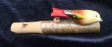 Carved wood bird whistle unique and works 6  X 1  diameter Made in Switzerland