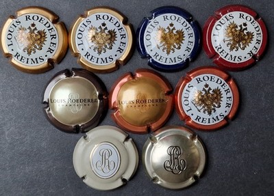 Konvolut Buchstabe R - ROEDERER LOUIS Wappen / 9 KAPSELN PLATTE SCHNAUZE CHAMPAGNER