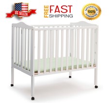 delta emery mini crib