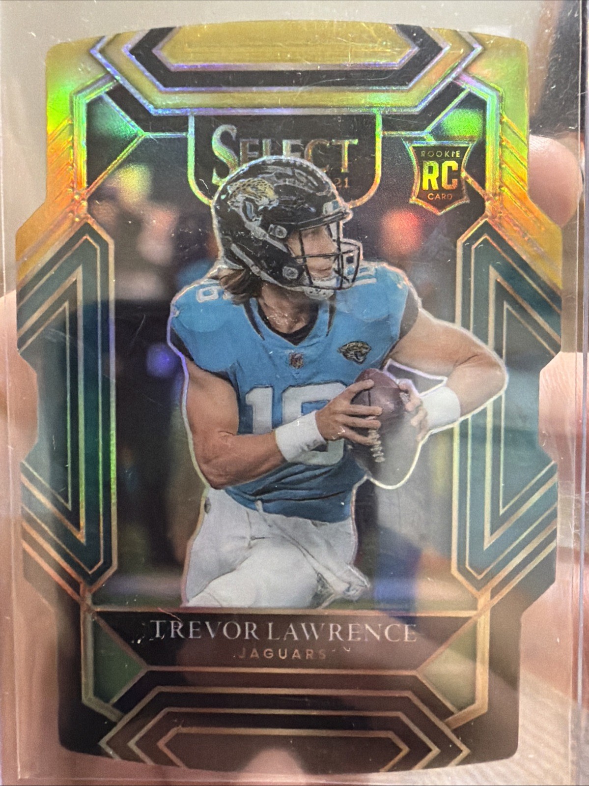 2021 Panini Select - Club Level Trevor Lawrence Black & Gold Prizm Die-Cut (RC)