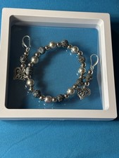 Women Bracelet And Earrings.