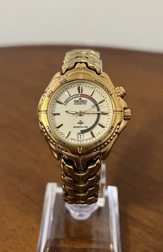 Vintage Seiko Kinetic 3M22-0B99 Sport 100 Women Gold Watch Water Resistant