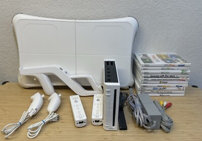 Wii console bundle, wii board, 10 wii games, 2 wii controllers, 2 wii joysticks