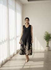 V-neck midi-length dress in a solid black color.