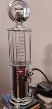 alcohol dispenser gas pump/ schwinn badge-excellent condtion