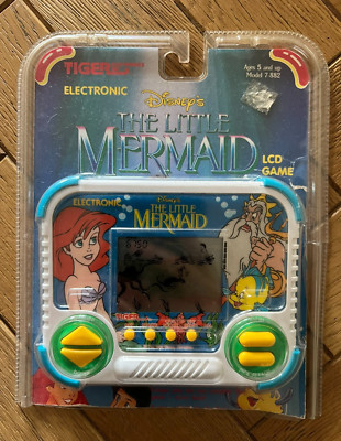 Tiger Electronic Handheld Die kleine Meerjungfrau LCD Spiel 7-882 mit Handbuch & Box