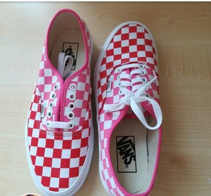 red and pink checkerboard vans
