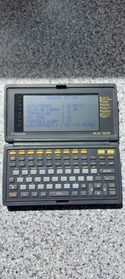Packard Bell DB128 Deluxe PDA Includes Batteries - Image 1 of 4