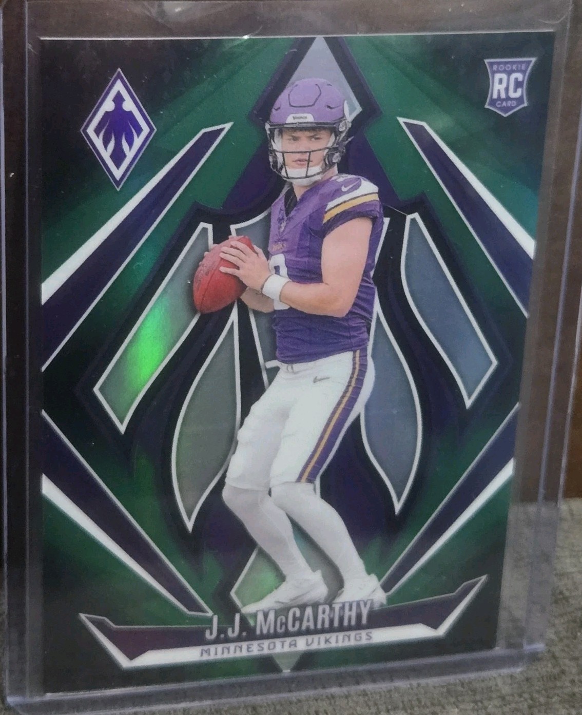 2024 Panini Phoenix Rookies J.J. McCarthy #185 Green Fade /199 (RC)