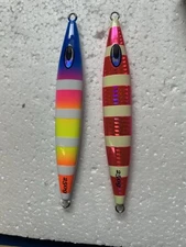 2 Pack  250 Gram Jigs With Glow and vibrant Colors. **See Description**