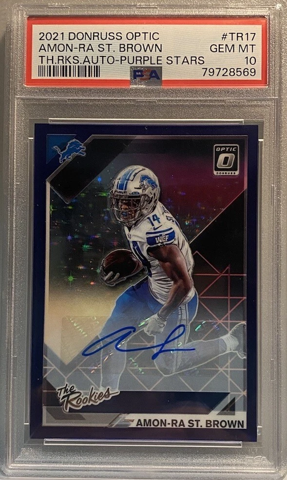 Amon-Ra St. Brown Panini Donruss Optic the Rookies Autographs #TR17 Purple Stars