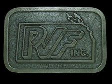 TI07144 VINTAGE 1970s  PVF INC.  ADVERTISEMENT BELT BUCKLE